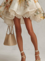 Blanche | Vestido mini trapecio de organza floral beige con ribete de encaje
