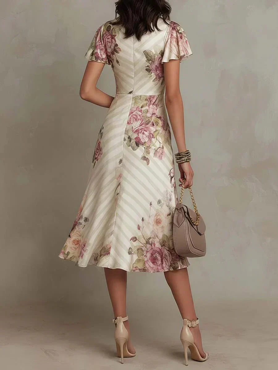 Alba | Vestido midi cruzado y fruncido con estampado floral