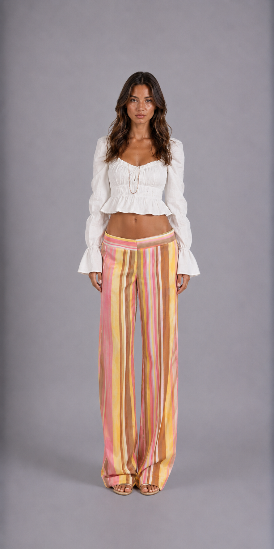 Pantalón largo a rayas verticales elegante para mujer, vista frontal - Clara Vellier