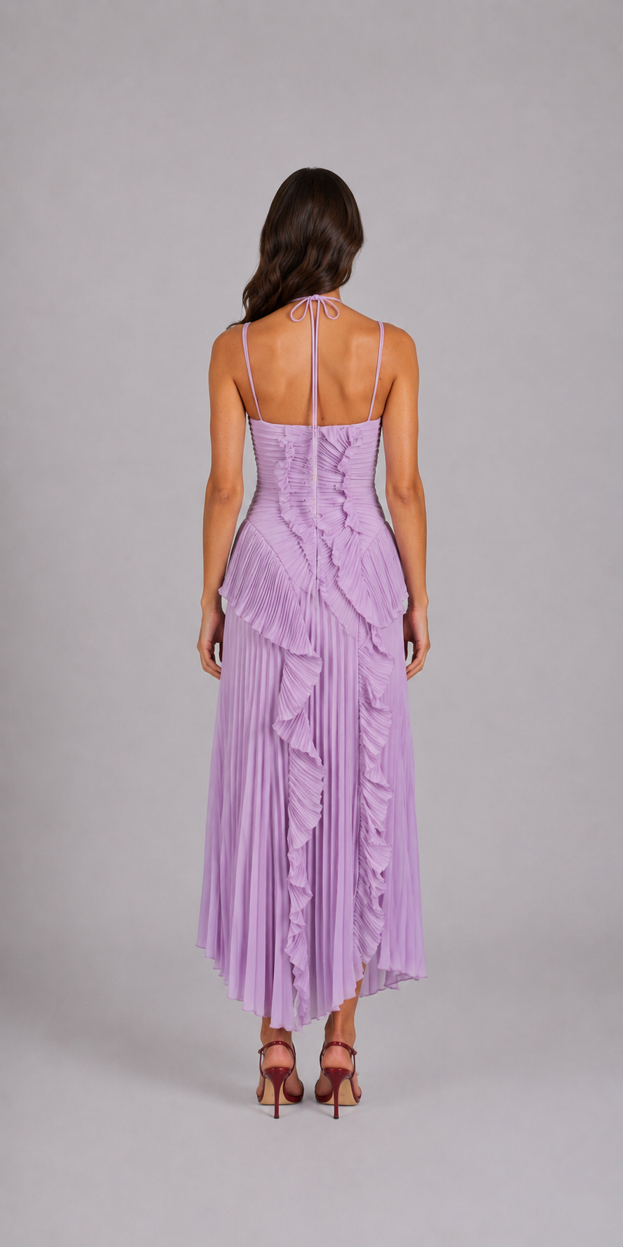 Vestido largo de invitada con volantes en lila suave, vista trasera - Clara Vellier