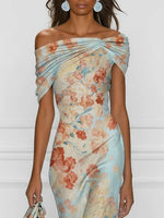 Victoire | Vestido midi corte sirena con hombros al aire y estampado floral azul