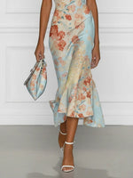 Victoire | Vestido midi corte sirena con hombros al aire y estampado floral azul