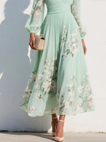 Susane | Vestido largo plisado de muselina verde menta con estampado floral