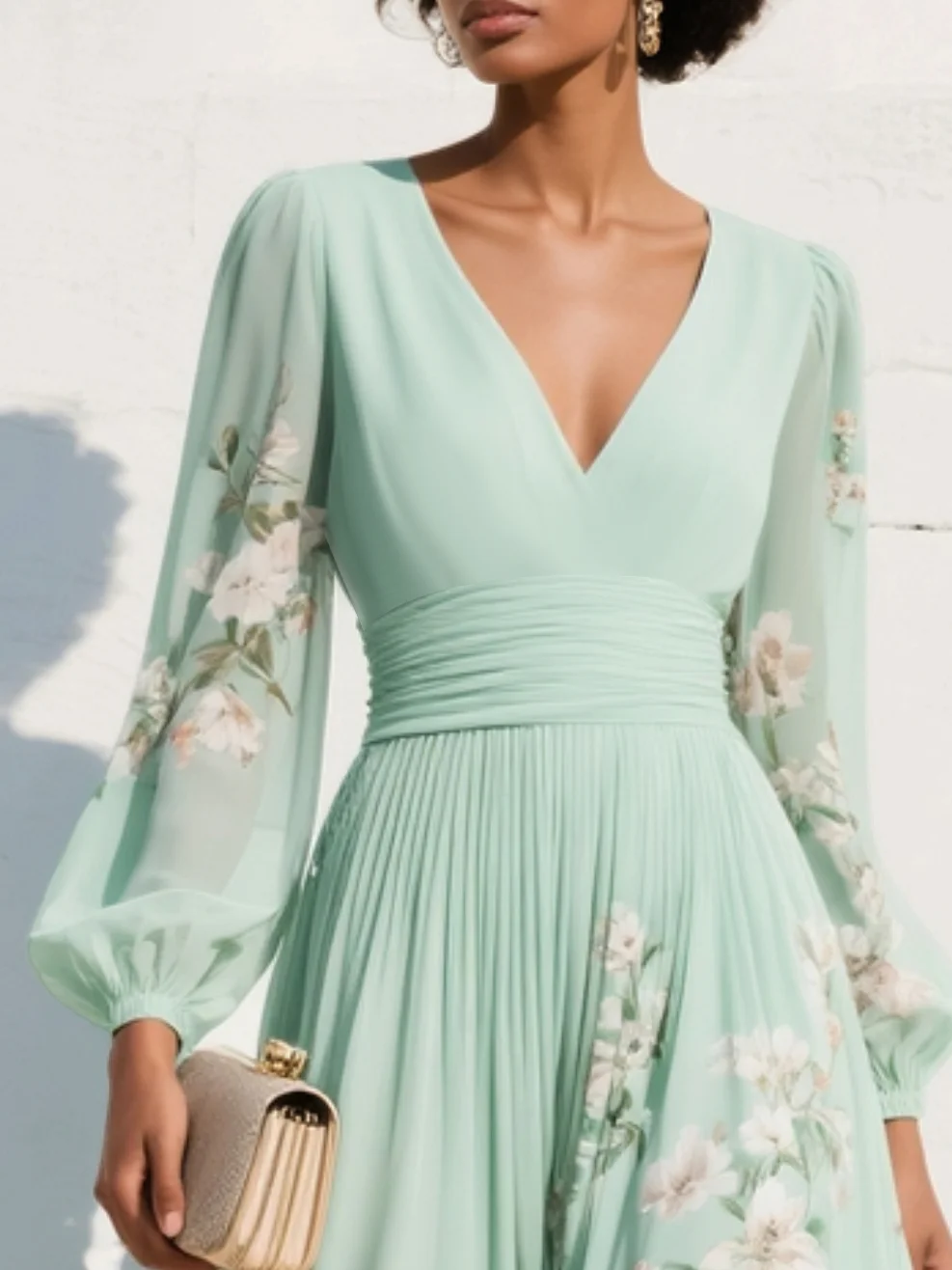 Susane | Vestido largo plisado de muselina verde menta con estampado floral