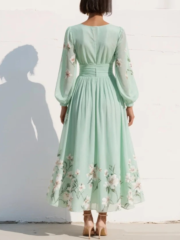 Susane | Vestido largo plisado de muselina verde menta con estampado floral