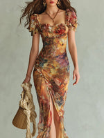 Violette | Vestido largo de muselina naranja con estampado efecto pintura al óleo estilo boho