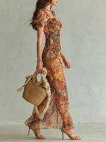 Violette | Vestido largo de muselina naranja con estampado efecto pintura al óleo estilo boho