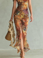 Violette | Vestido largo de muselina naranja con estampado efecto pintura al óleo estilo boho