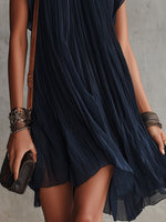 Apolline | Vestido mini plisado de muselina bordada con flores azul marino