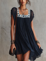 Apolline | Vestido mini plisado de muselina bordada con flores azul marino