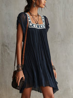 Apolline | Vestido mini plisado de muselina bordada con flores azul marino