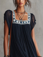 Apolline | Vestido mini plisado de muselina bordada con flores azul marino