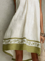 Agathe | Vestido mini trapecio sin mangas blanco y verde oliva con flores