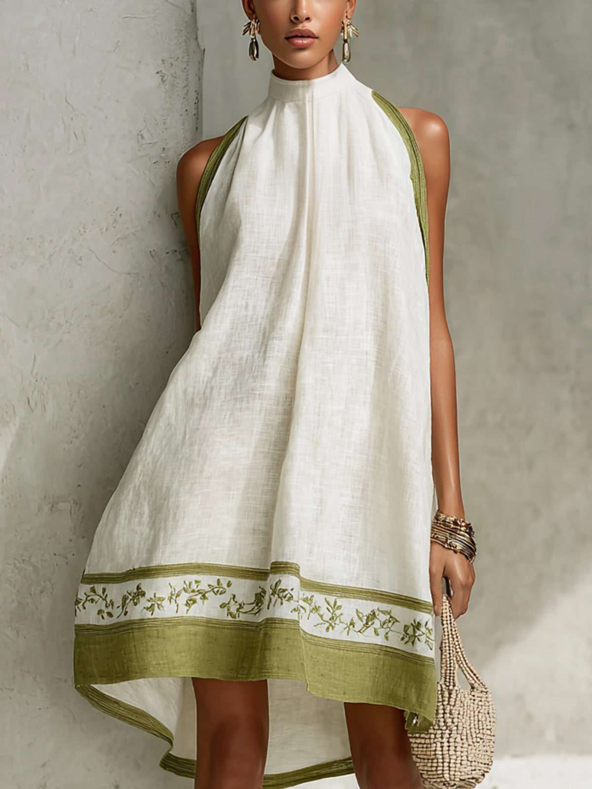 Agathe | Vestido mini trapecio sin mangas blanco y verde oliva con flores