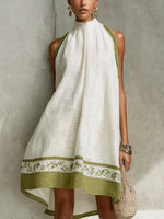 Agathe | Vestido mini trapecio sin mangas blanco y verde oliva con flores